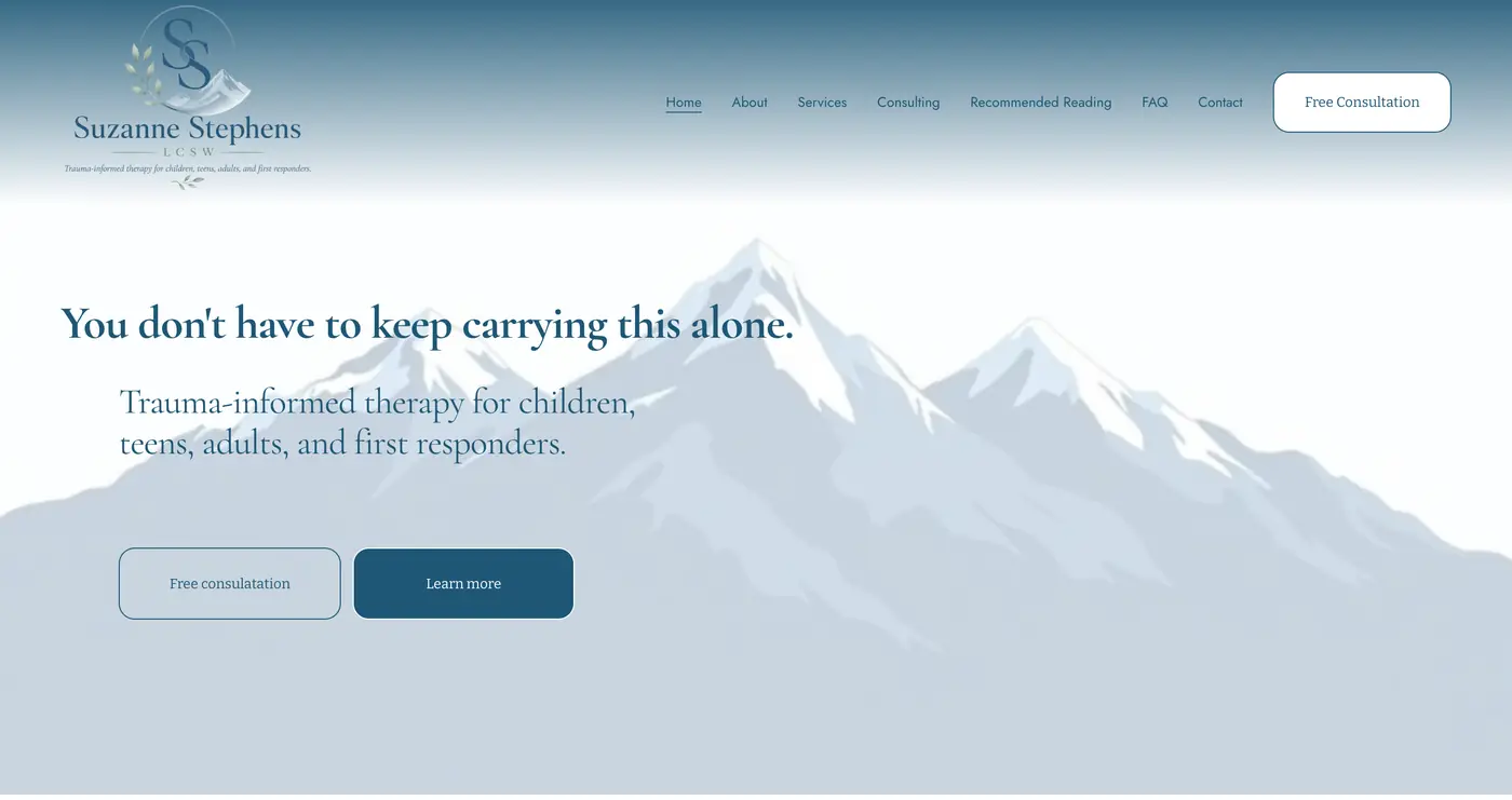 Homepage of Suzanne Stephens LCSW with a misty blue mountain background and the headline 'You don't have to keep carrying this alone'